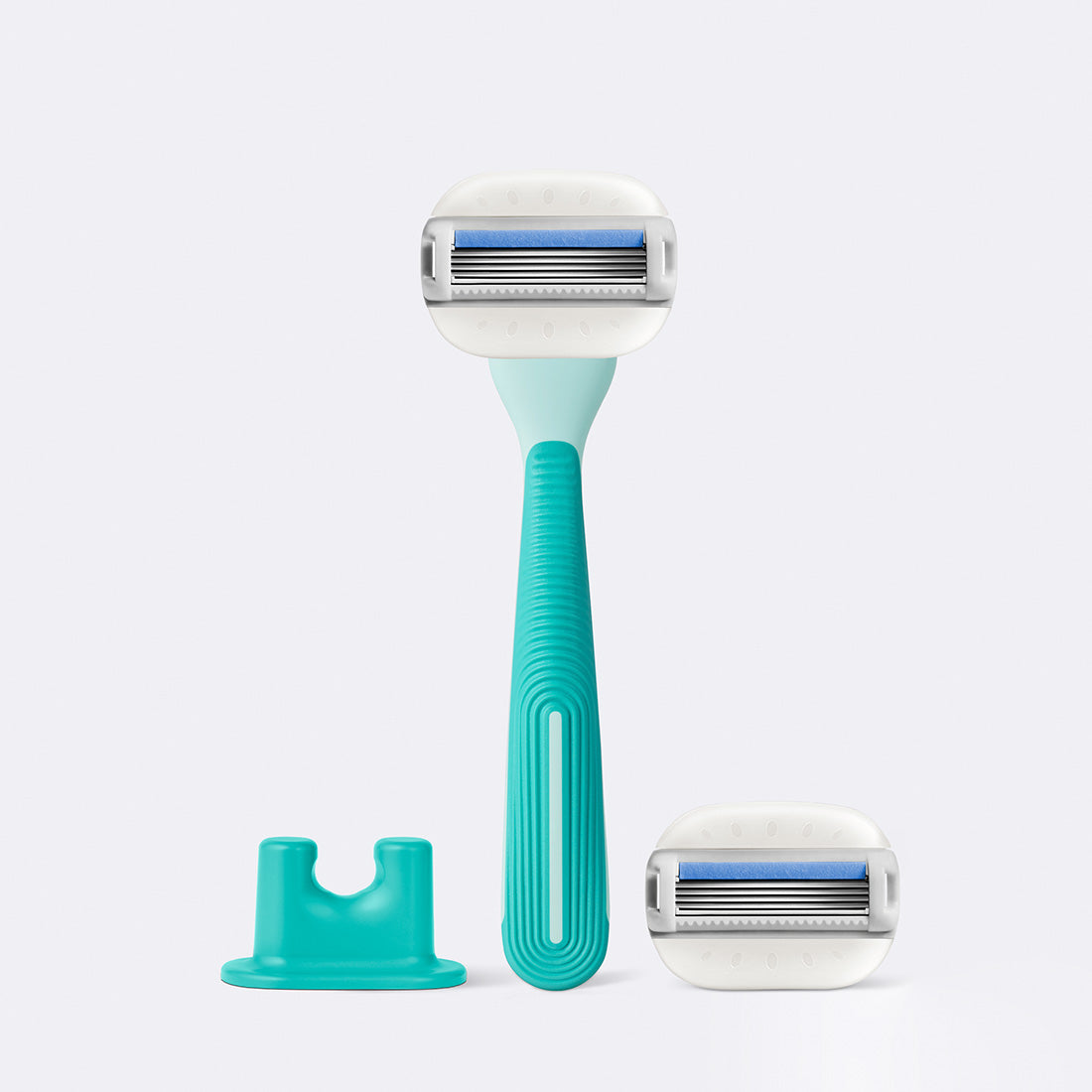 Moisture Plus Razor, Shower Holder and blade in the color Seafoam.