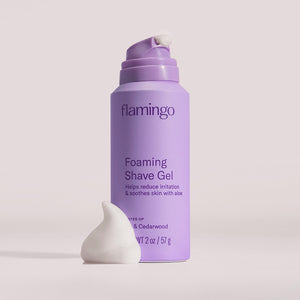 Can of mini Foaming Shave Gel on a grey background.