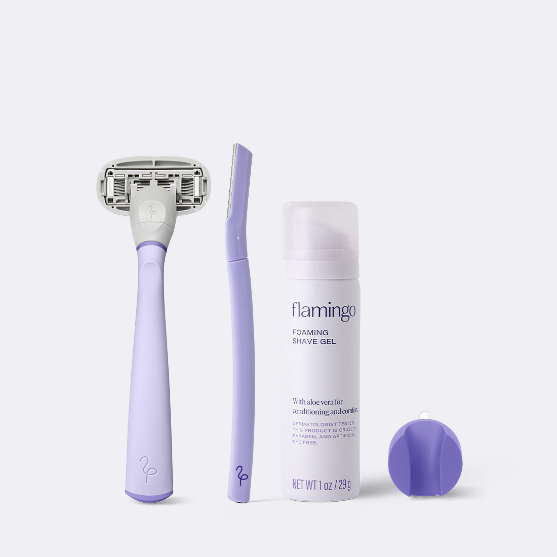 Lilac Original Razor, Disposable Dermaplane razor, mini shave gel and lilac shower holder on a white background.
