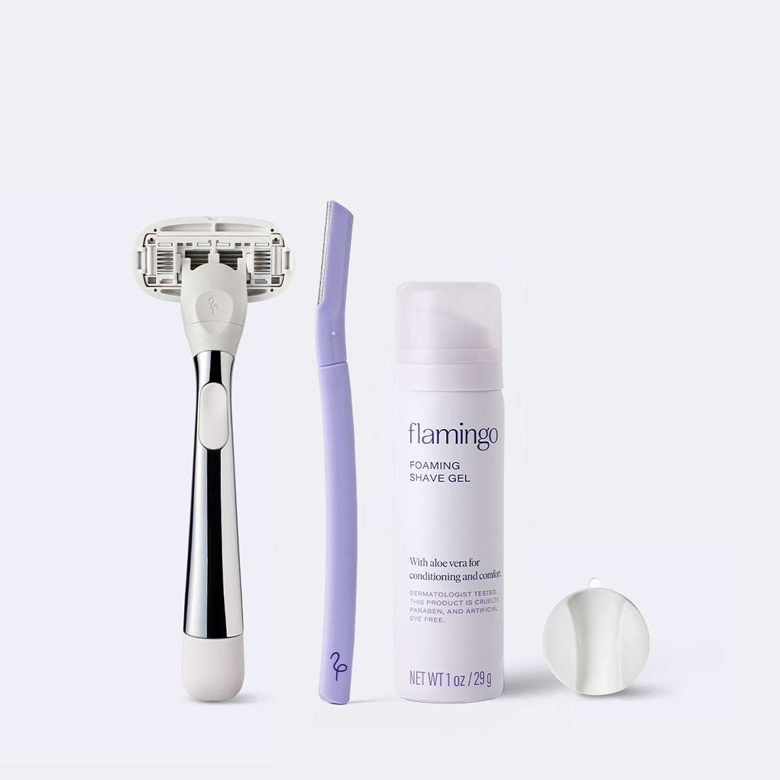 Chrome Original Razor, Disposable Dermaplane razor, mini shave gel and white shower holder on a white background.