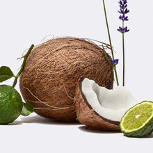 The serum's scent notes of bergamot, coconut and lavender sitting on a white background.