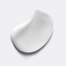 Close up of the Pubic Restorative Post Shave serum's light and velvety texture.