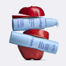 Restorative Post Shave Serum sandwiched between slices of apple.
