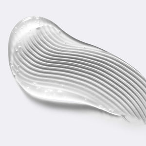 Close up of the Pubic Exfoliating Shave Gel's clear, gel texture.