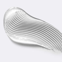 Close up of the Pubic Exfoliating Shave Gel's clear, gel texture.