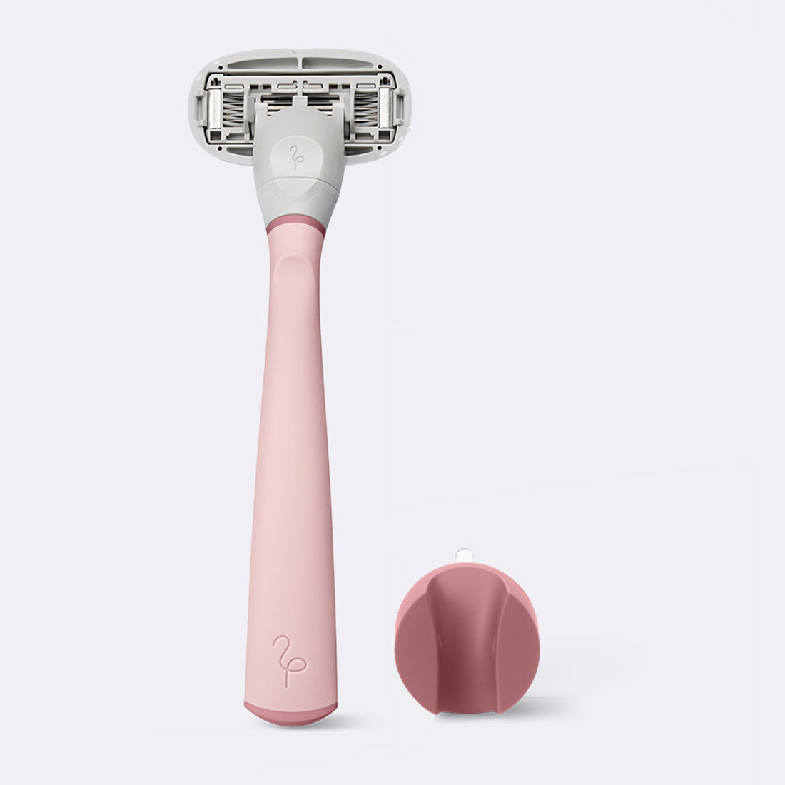 Original Razor and shower holder, in the color rose, on a white background.