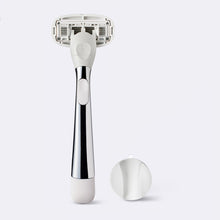 Original Chrome Razor and shower holder, on a white background.