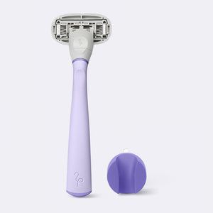 Original Razor and shower holder in the color Lilac on a white background.