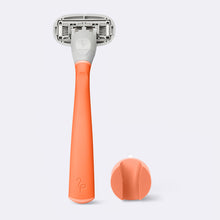 Original Razor and shower holder, in the color Papaya, on a white background.