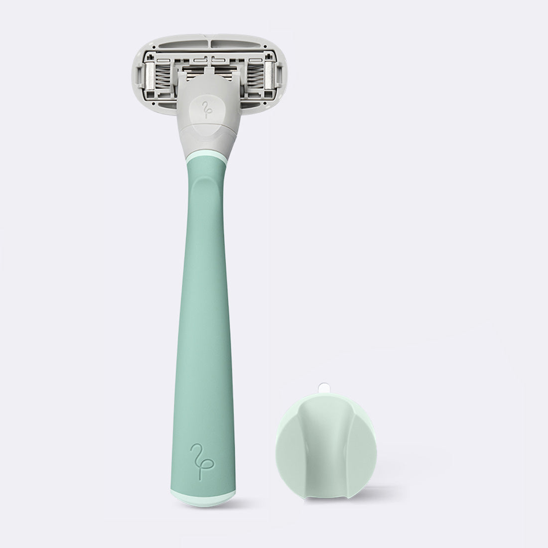 Original Razor and shower holder, in the color sage, on a white background.