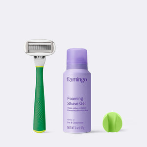 Bright Green Original Razor, Mini shave gel and shower holder on a grey background.