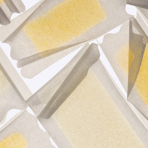 Backlit image of Flamingo Wax Strips on a white background