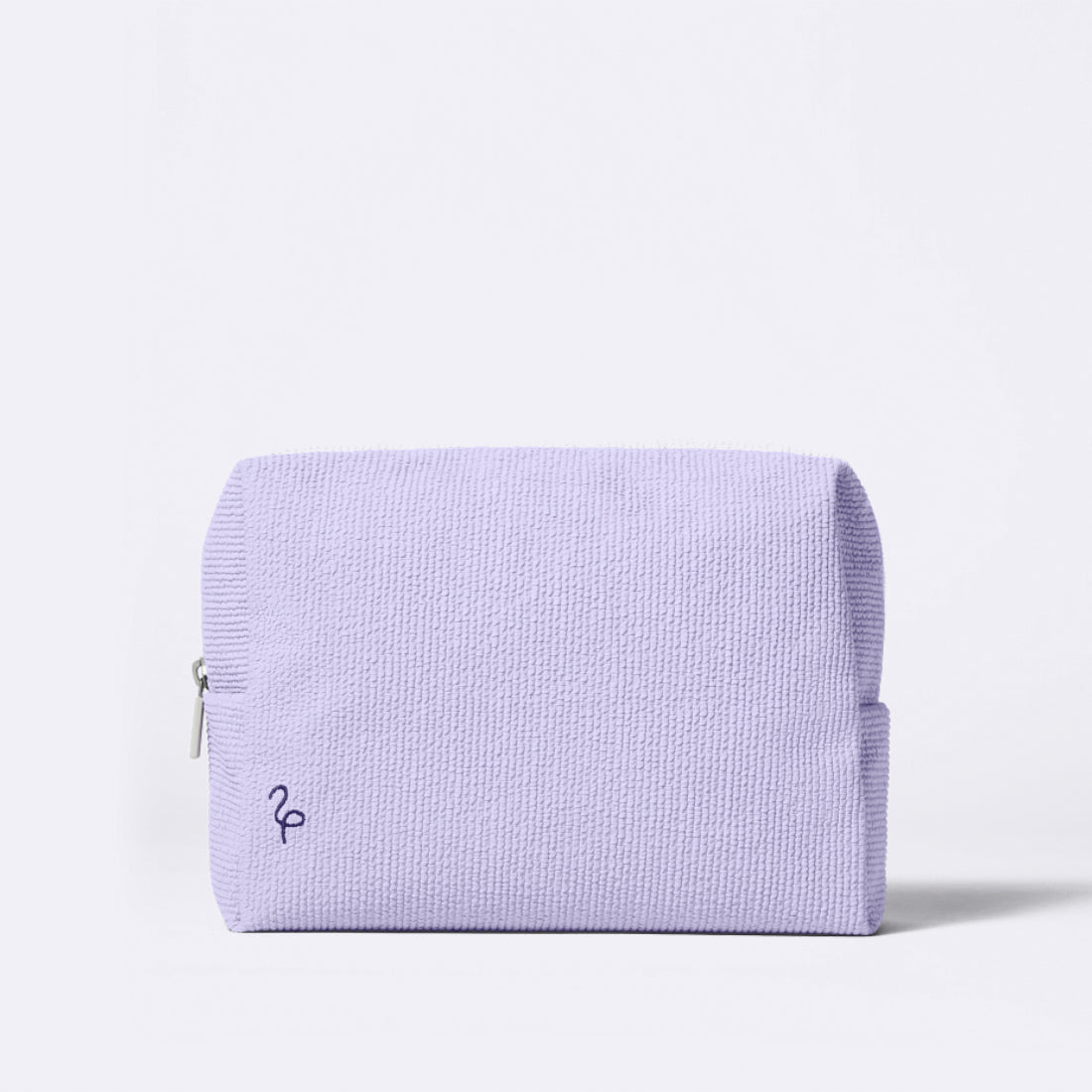 Lilac Flamingo Makeup Bag in a ribbed lilac cotton fabric with a small embroidered dark purple flamingo bird logo