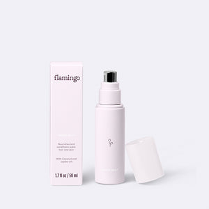 A pale purple bottle of Flamingo Mons Mist with the cap taken off to display the polished chrome spray nozzle