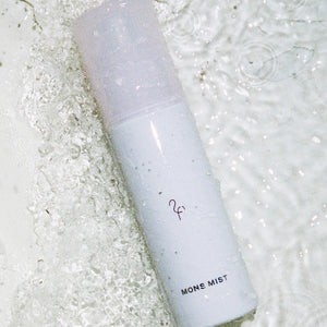 Mon Mist surrounded by rippling water.