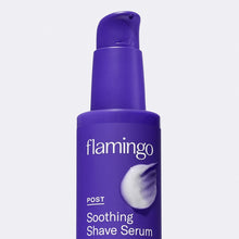 Close up of the top of the Soothing Post Shave Serum's pump packaging with a bit of serum smeared on the bottle. 