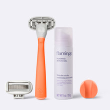 Flamingo Starter Set in the color Papaya, featuring a razor, shower holder, extra blade, and mini 1oz foaming shave gel